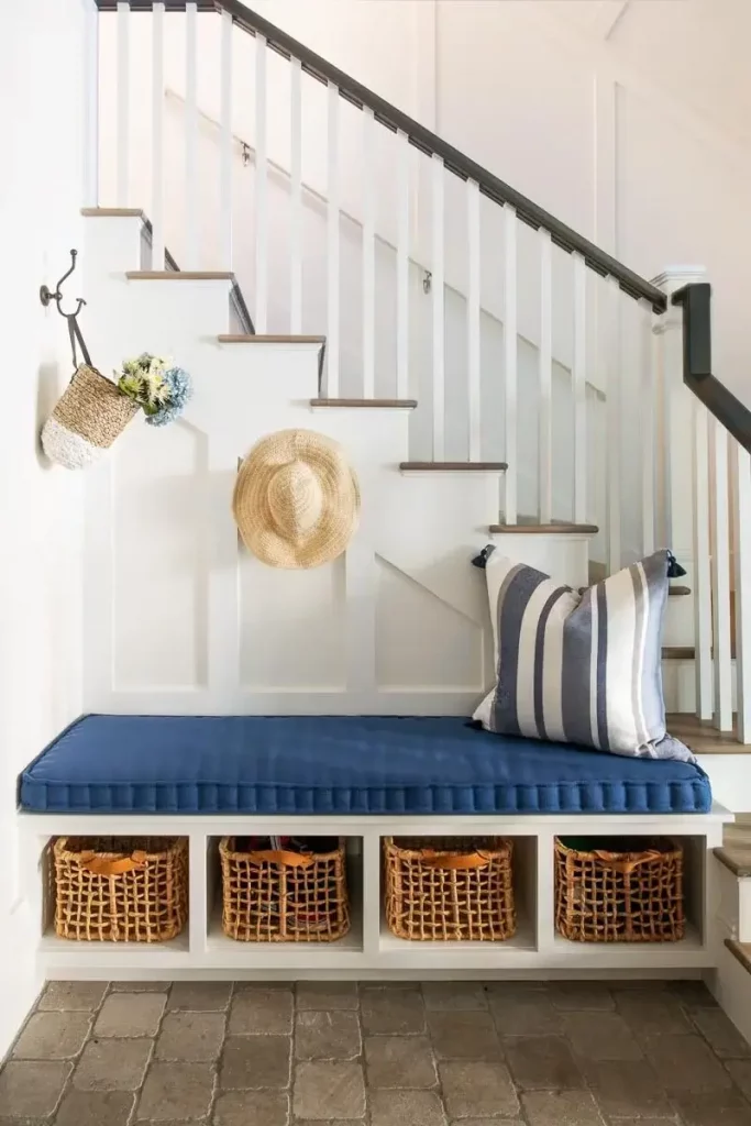 entryway and under the stair storage and bench