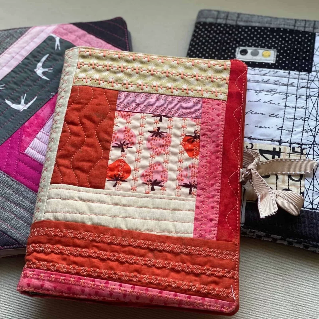  A fabric-covered journal and disposable camera set, a creative DIY birthday gift.