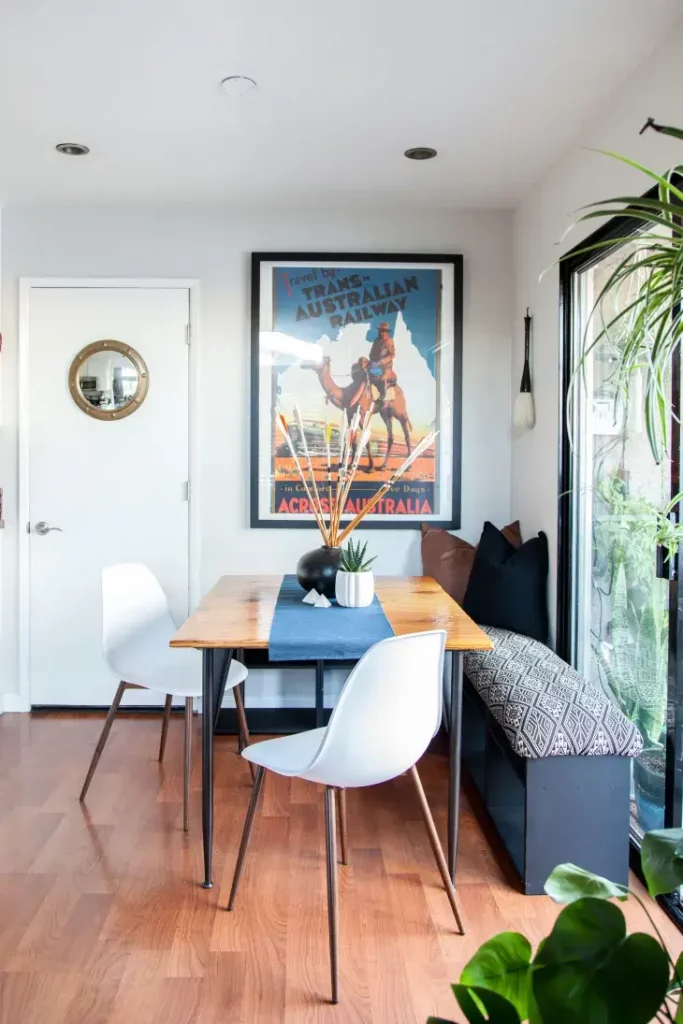 Breakfast corner with storage bench and table.
