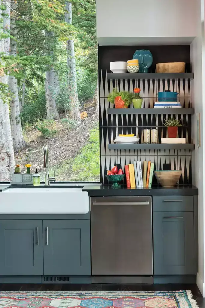 Black and white tiles in a backgammon-inspired geometric kitchen backsplash pattern