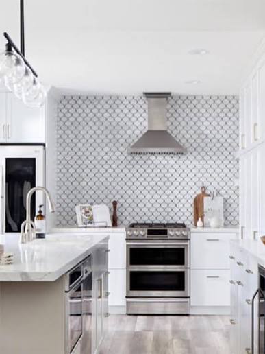 Black and white Moroccan lantern tiles used as a decorative kitchen backsplash