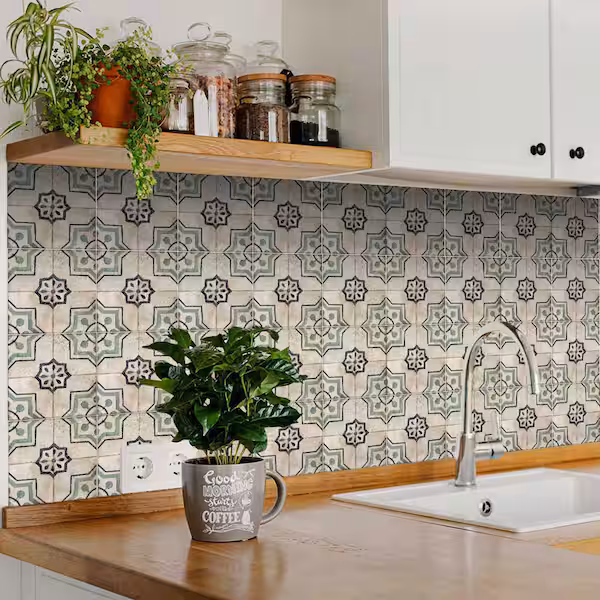 Kitchen backsplash ideas featuring off-white tiles with a subtle black and gray pattern