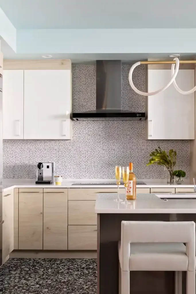 Black and white tiles with a tiny dot pattern for a vintage kitchen backsplash
